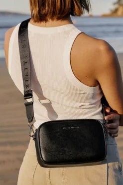 Status Anxiety Plunder Black Crossbody Bag Webbed Strap