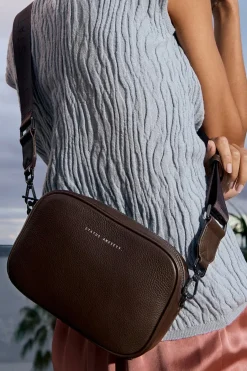 Status Anxiety Plunder Cocoa Crossbody Bag Webbed Strap